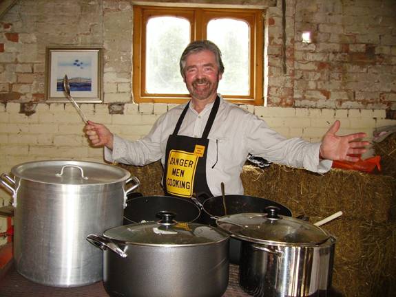 Michael Mahon about to serve the food