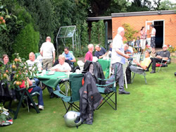 Riders and passengers enjoying tea and cakes