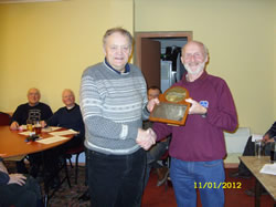 Dave McMahon receives the Chairman's award from chairman Harry Wiles.