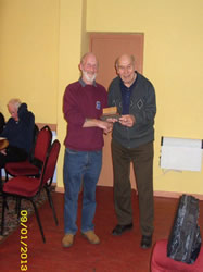 Glen Hughes receiving the Golden Brick