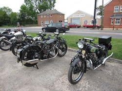 The three vintage bikes cooling down at the caf&eacute;.