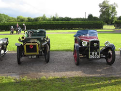 Richard woodcock&rsquo;s Humberette next to John Lycett&rsquo;s BSA three wheeler.