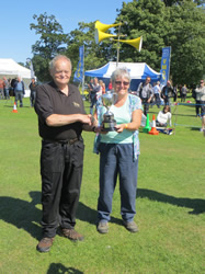 Dave Mac receiving his cup